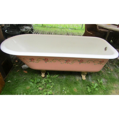 1666 - A Victorian cast iron and enamel roll top bath with gilt painted claw and ball feet