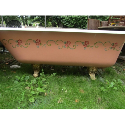 1666 - A Victorian cast iron and enamel roll top bath with gilt painted claw and ball feet