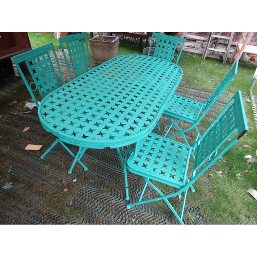 1669 - A contemporary green painted light steel D ended garden terrace table and five matching folding chai... 