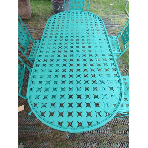 1669 - A contemporary green painted light steel D ended garden terrace table and five matching folding chai... 