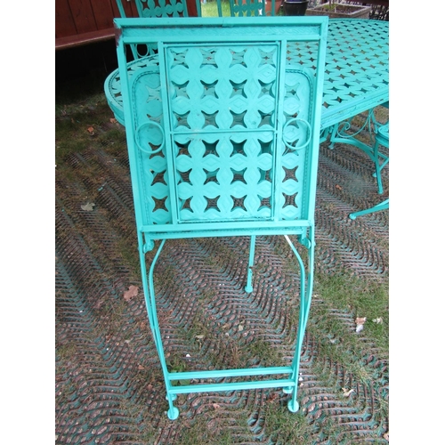 1669 - A contemporary green painted light steel D ended garden terrace table and five matching folding chai... 