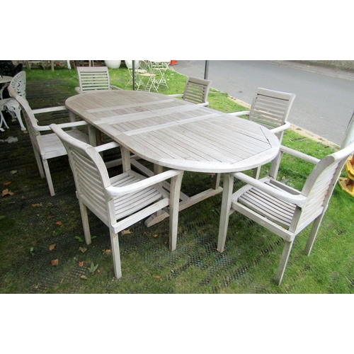 1674 - A contemporary weathered (silvered) teak D end pull out extending garden table with slatted top, bi-... 