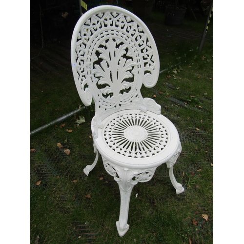 1662 - A cream painted cast aluminium garden terrace table of circular form with decorative pierced top and... 