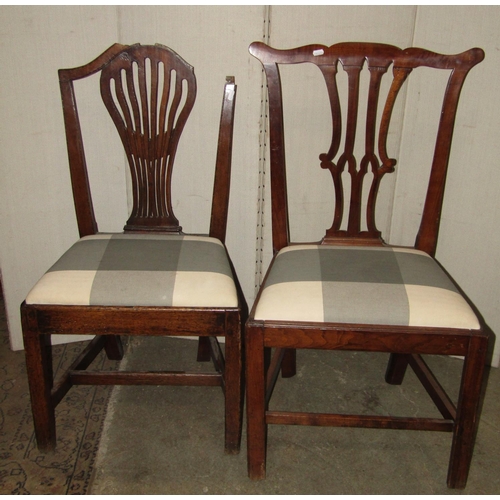 1804 - Two similar 19th century open elbow chairs with rush seats, swept bar backs, scrolled arms and sabre... 