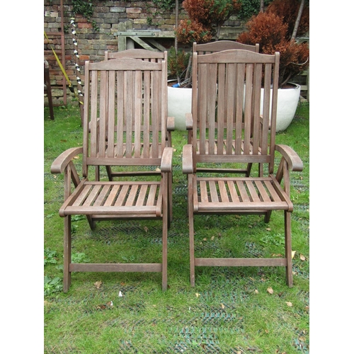 1682 - A set of four Ferman contemporary teak folding garden armchairs with slatted seats and backs