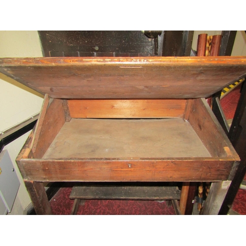 1755 - A stained pine clerks desk and combined stand with hinged sloping lid and vacant interior, circa 190... 