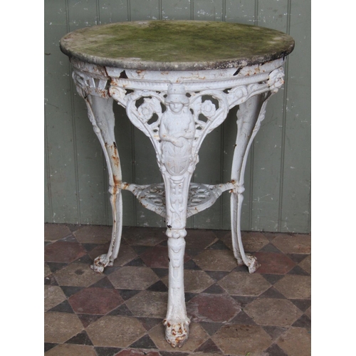 1707 - A cast iron Britannia head pub table of circular form with swept paw feet, painted finish beneath an... 