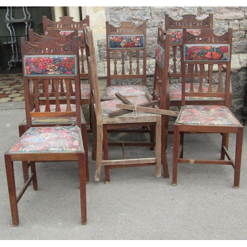 1826 - A set of eight (6&2) Edwardian Arts & Crafts style dining chairs with shaped splats, upholstered sea... 