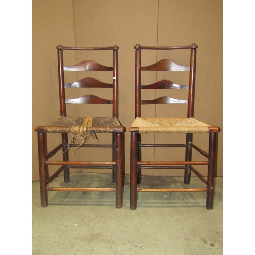 1827 - A set of four 19th century ash-wood country dining chairs with graduated ladder-backs over  rush sea... 