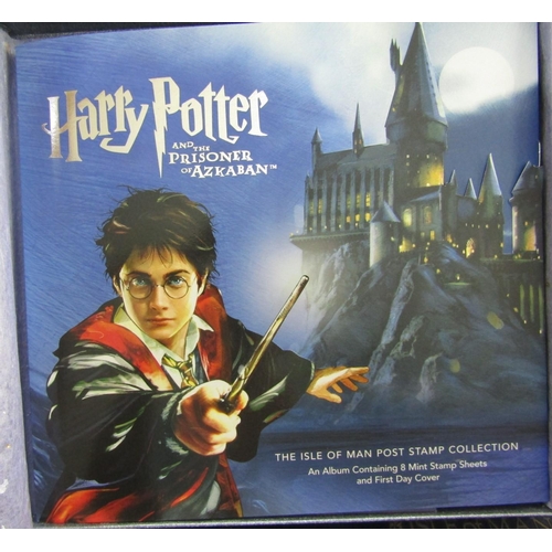 2337 - A box containing a quantity of Isle of Man stamps collector  year packs, Harry Potter limited editio... 