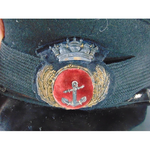 1441 - Naval dress cap with stitched emblem, the interior with label inscribed 'G. Gerimal, Late of Dubasch... 