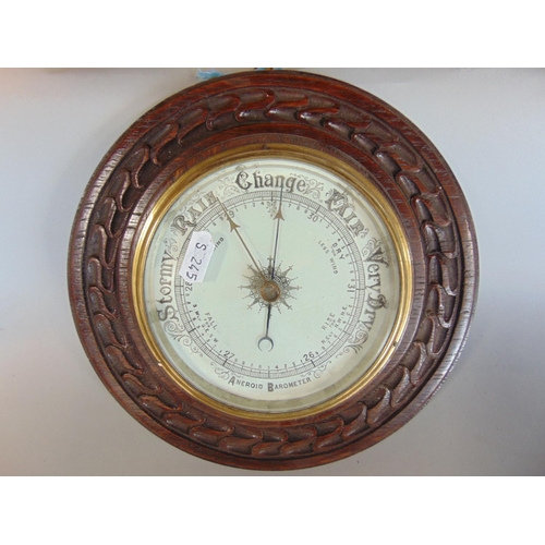 1203 - Aneroid barometer circular wall barometer, with carved oak frame, together with a drop dial wall clo... 