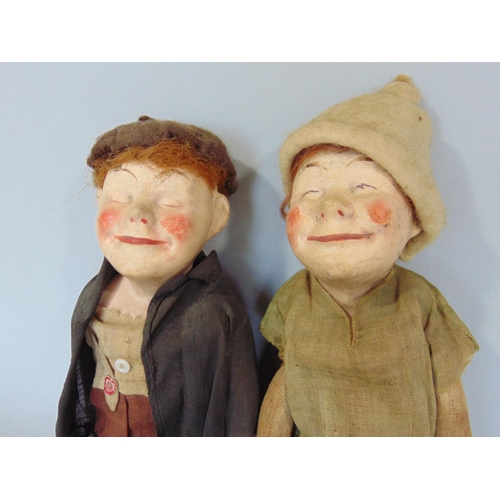 1244 - An unusual pair of early 20th century character  dolls  'Bisto Kids' with composition heads and stra... 