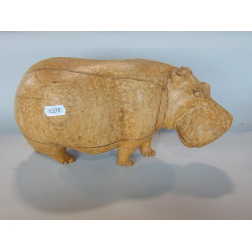 1404 - A mixed lot to include a carved treen wooden Hippo, pair of stitched leather clad tea light holders,... 