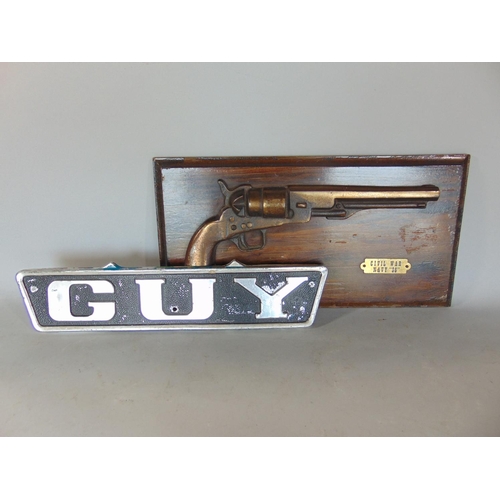 1408 - Cast aluminium vehicle badge inscribed GUY, and a further gun wall plaque for the Civil War Navy 36 ... 