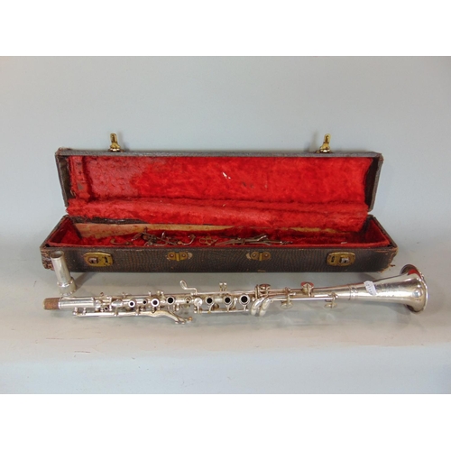 1413 - Champion of American silver plated clarinet, in case (case af)