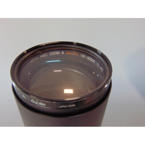 1453 - Made in USSR large lens with carry case and box, HC8, 70 x 0 .75 oC12; together with a further leath... 