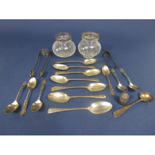 839 - A mixed collection of various silver spoons to include a set of coffee bean spoons with fancy handle... 