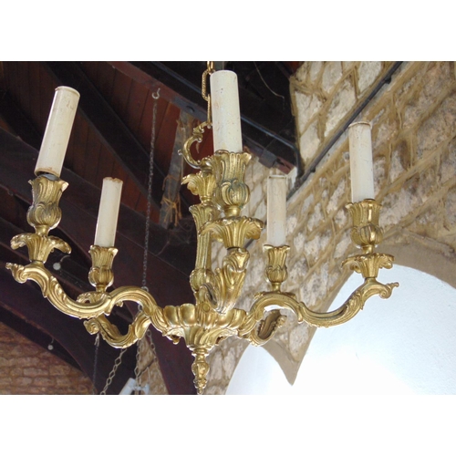 1438 - Rococco style cast gilt metal five branch hanging ceiling light, 47 cm diameter