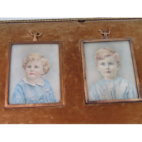 1077 - D Wix (early 20th century British school) - Pair of bust length miniature portraits of a young brown... 