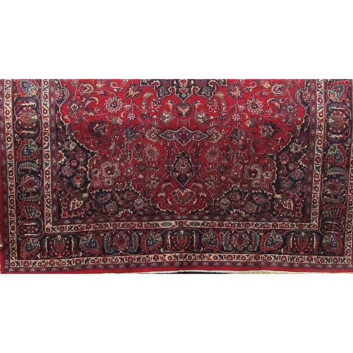 2378 - Good large Persian Mashad country house type full pile carpet, with scrolled blue decoration upon a ... 