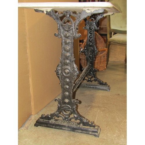 1881 - A cast iron pub table of rectangular form with decorative detail and raised lettering, Gaskell and C... 