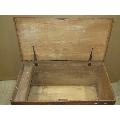 1885 - A 19th century elm blanket box with hinged lid, exposed dovetail construction, moulded plinth and ir... 