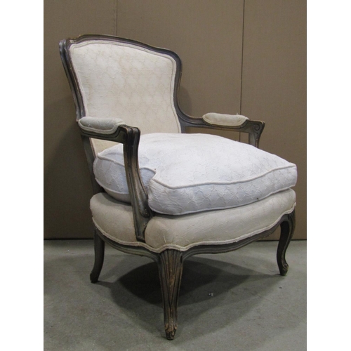 1917 - A pair of 19th century futiles, with cream ground floral patterned upholstered seats and shield shap... 