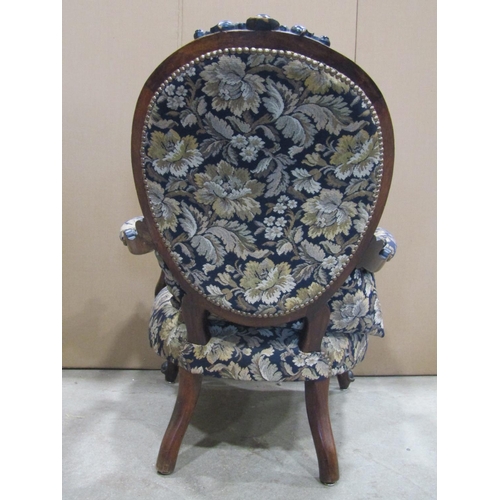 1922 - A Victorian drawing room chair, with floral patterned upholstered sprung seat with serpentine front,... 