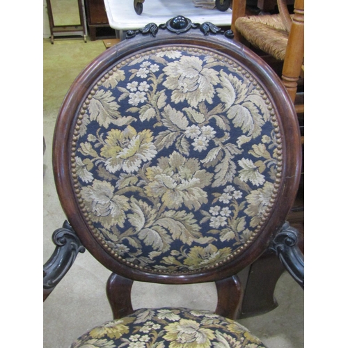 1922 - A Victorian drawing room chair, with floral patterned upholstered sprung seat with serpentine front,... 