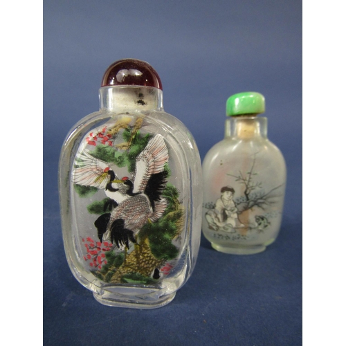 762 - A collection of four Chinese reverse painted glass scent bottles, together with a further Chinese re... 