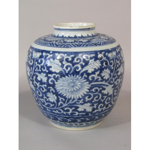 667 - An oriental blue and white vase of bulbous form, with all over chrysanthemum scrolling and leaf deta... 