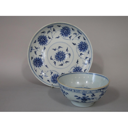 673 - A 19th century oriental blue and white dish with flower detail and blue painted six character mark t... 