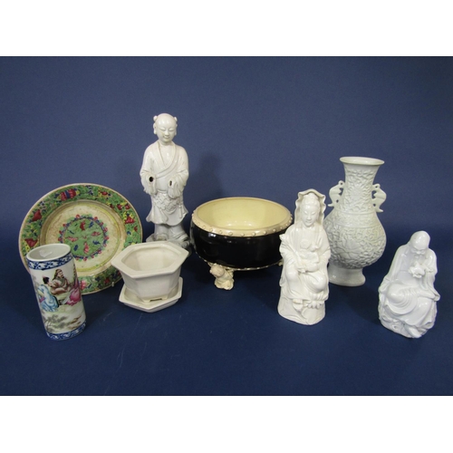 675 - A collection of oriental ceramics including three Blanc De Chine figures male and female of immortal... 