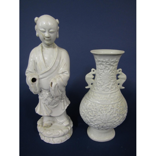 675 - A collection of oriental ceramics including three Blanc De Chine figures male and female of immortal... 