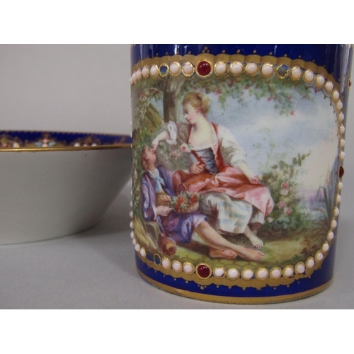 684 - An 18th century Sevres blue ground cabinet cup and saucer with central Watteauesque style painted pa... 