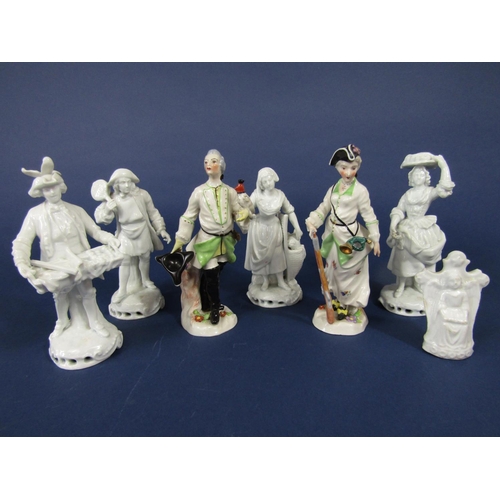 702 - A set of four late 19th century white glazed Neapolitan figures of street vendors all with blue crow... 