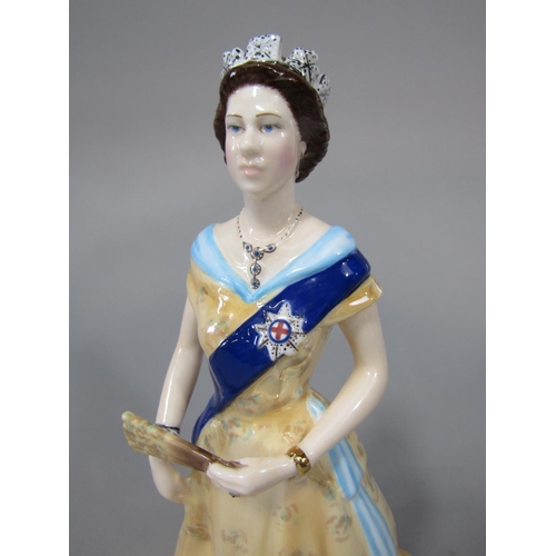 708 - A boxed limited edition figure of HM Queen Elizabeth II celebrating the diamond jubilee of 2012, num... 