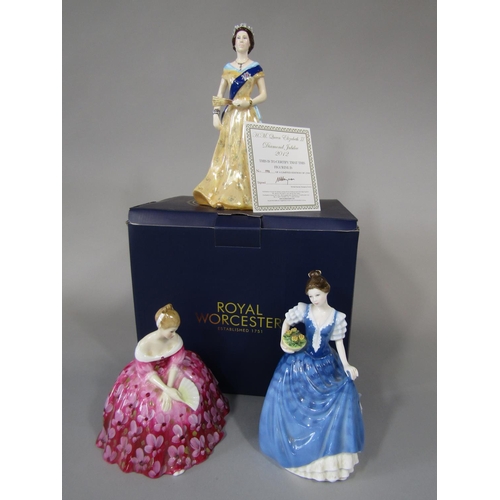 708 - A boxed limited edition figure of HM Queen Elizabeth II celebrating the diamond jubilee of 2012, num... 