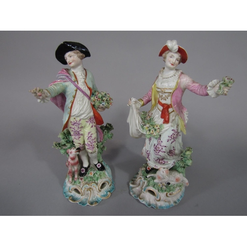 713 - A pair of 18th century Derby figures of a fruit picker accompanied by his dog and a shepherdess gath... 