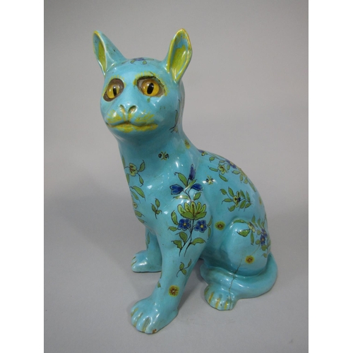 715 - An early 20th century cat in the Galle manner with turquoise glaze and painted floral decoration in ... 