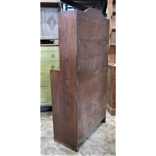 1930 - An early 20th century oak, floorstanding open bookcase of stepped form in the art deco style, with t... 