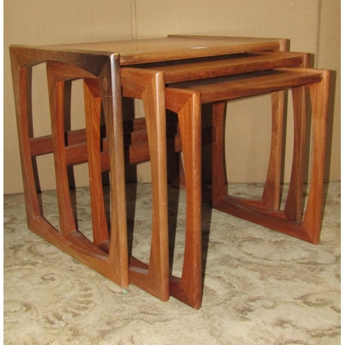 1935 - A nest of three G-Plan teak quadrille occasional tables