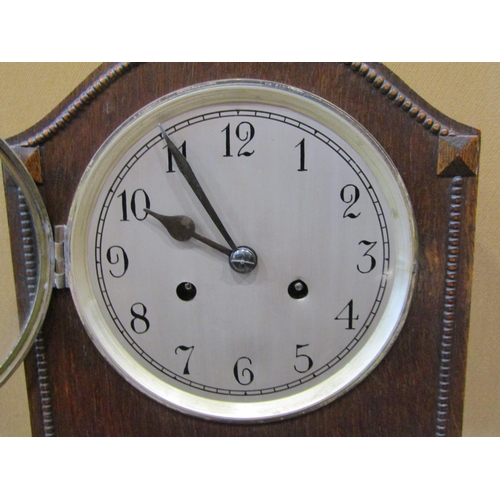 1949 - An early 20th century oak Grandmother clock, with circular dial and applied mouldings