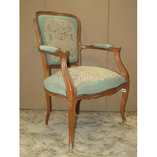 1982 - A pair of late 19th century futiles/salon chairs, with floral tapestry upholstered seats and shield ... 