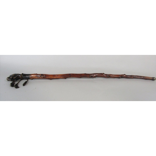 1263 - A primitive knobbly walking cane, possibly hawthorn, with carved monkey knop