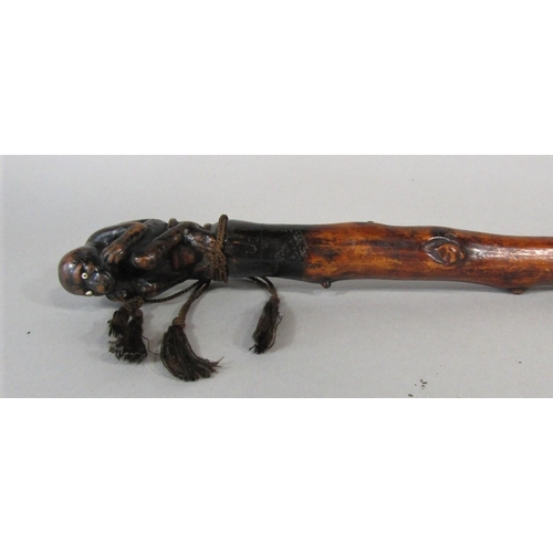 1263 - A primitive knobbly walking cane, possibly hawthorn, with carved monkey knop