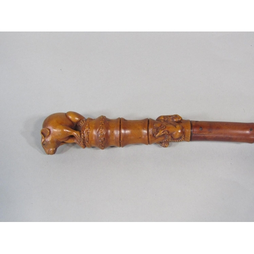 1264 - A good carved Japanese simulated bamboo fruit wood walking stick, mounted by a carved rat knop and s... 