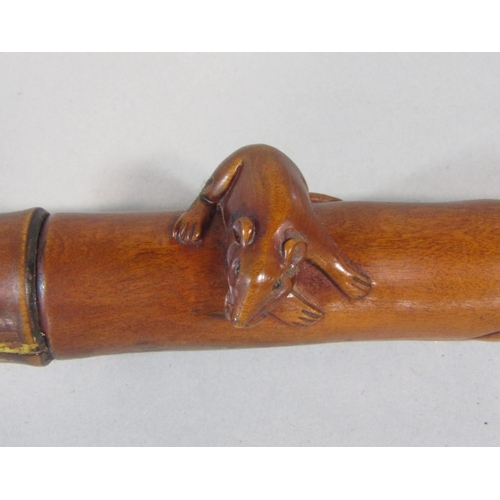 1264 - A good carved Japanese simulated bamboo fruit wood walking stick, mounted by a carved rat knop and s... 