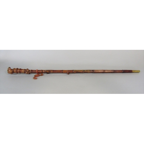 1264 - A good carved Japanese simulated bamboo fruit wood walking stick, mounted by a carved rat knop and s... 